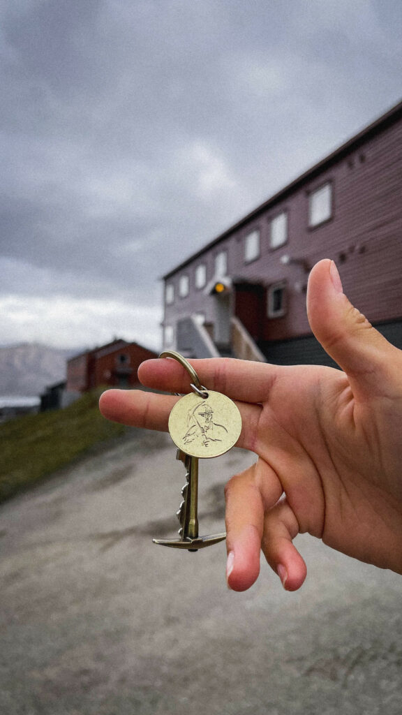 a key to a room at coal miners lodge hotel